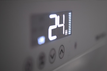 24°C as indicated by the digital liquid of the air conditioner.