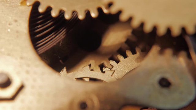 The brass clockwork works. 4K macro
