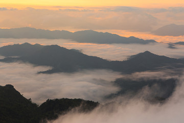 Colorful color sky with sea of mist and cloud and silhouette mountains at dawn time before sunrise, take photo from top of mountain in Thailand