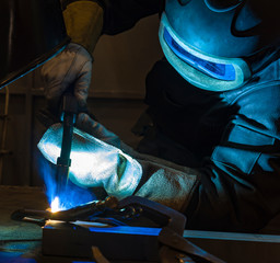 Industrial steel welder in factory welder, craftsman