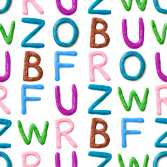 Seamless pattern with alphabet. Handmade modeling clay letters. Realistic 3d vector lettering background.