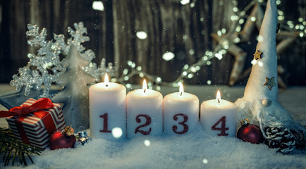 burning candles in romantic christmas mood on the holy evening