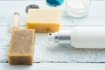 hygiene and beauty product samples, powder compact, spray, soap, moisturizer