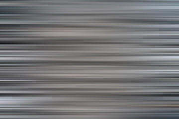 Abstract horizontal  lines background. Streaks are blurry in motion.