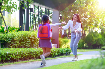Mom mother in motion of happy by opening arm welcome home of daughter, girl daughter exciting in returns home after school study