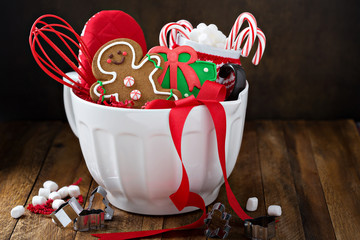 Christmas gift for bakers, mixing bowl with a whisk, cookies and hot chocolate mix - Powered by Adobe