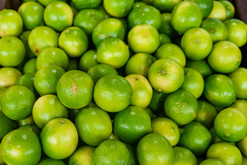 Freshly picket limes, close up.