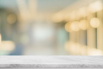 Empty white marble stone table top and blur glass window interior restaurant banner mock up...