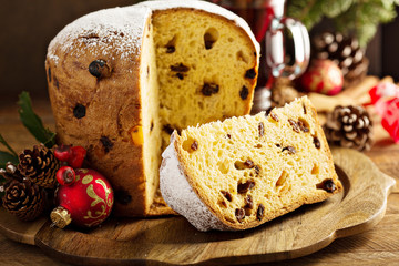 Traditional Christmas panettone with dried fruits and orange zest