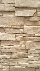 Stacked stone wall background vertical