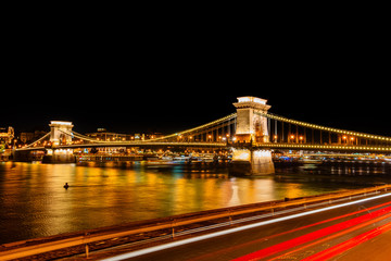 Budapest, Hungary-October 01, 2019: A night view of Szechenyi Chain Bridge over the Danube River in...