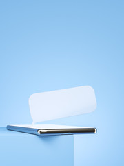 Smartphone with transparent text cloud on the blue table. Social network communication and text messengers concept. Vertical frame.