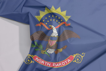 North Dakota fabric flag crepe and crease with white space. Flag of the unit by state troops in the Philippine-American War.