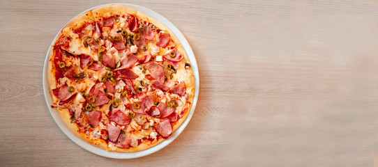  circle pizza on the table with place for text