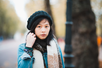 Charming Asian woman portrait in autumn season