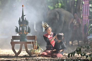 Shepherd in the jungle with elephantsThe elephants performed the ritual together with the elephants...