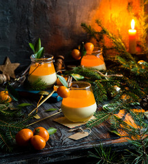 christmas layered dessert creamy panna cotta, jelly or souffle in glasses