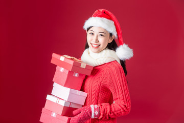asian woman hold christmas gifts