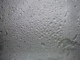 Frozen glass. Water drops