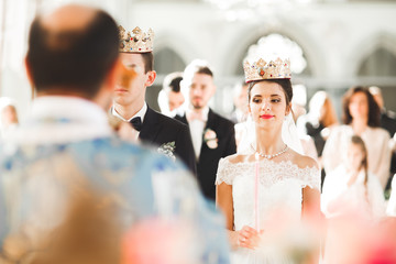 Wedding couple bide and groom get married in a church