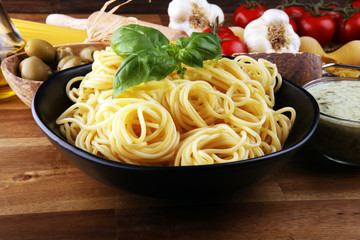 Spaghetti with gorgonzola and spinach souce with ingredients