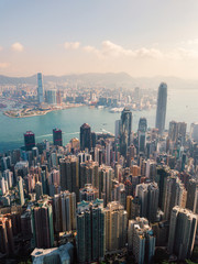 Aerial view of Hong Kong skyline under the sunlight.