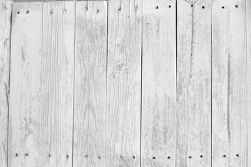 Naklejka premium white old wooden fence. wood palisade background. planks texture