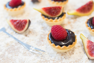 chocolate cakes and sweets and natural fruits