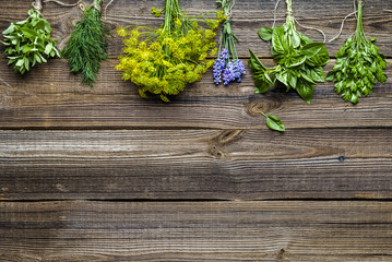 Various herbs from the garden on wooden table. Fresh herb, top view, flat lay