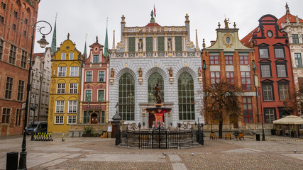 Obraz na płótnie Canvas Artus Court with Neptune fountain at the Long Market of Gdansk in Poland. 