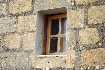 Fototapeta na wymiar Closed wooden framed window