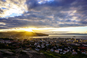 Sunset over Trondheim. Panorama of the city, top view. Norway