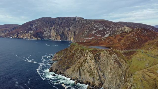 Aerial of Slieve League Cliffs are among the highest sea cliffs in Europe rising 1972 feet or 601 meters above the Atlantic Ocean - County Donegal, Ireland