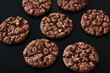 Delicious Christmas chocolate cookies with nuts for Breakfast