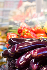 Fresh aubergine in supermarket. Concept of healthy food, bio, vegetarian, diet.