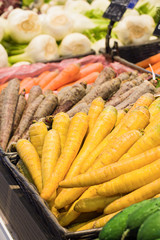 Fresh carrots in supermarket. Concept of healthy food, bio, vegetarian, diet.