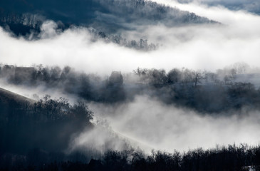 Misty morning in the mountains in autumn.