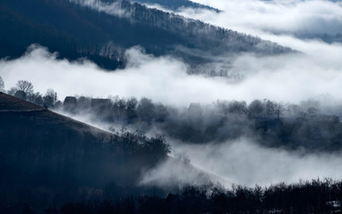 Misty morning in the mountains in autumn.