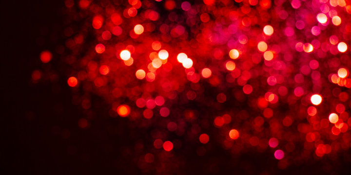 Valentines day background with red lights bokeh