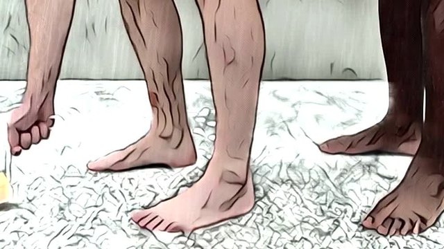 A cartoon animation of a person who reaches out to a soap on the ground of a prison shower. You can see the feet of another person behind him.