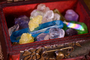 Various semi precious stones close up with crystals in the chest