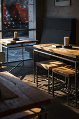 The interior of the cafe in dark colors.