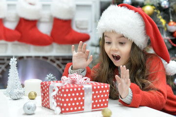 Close up portrait of girl with Christmas present