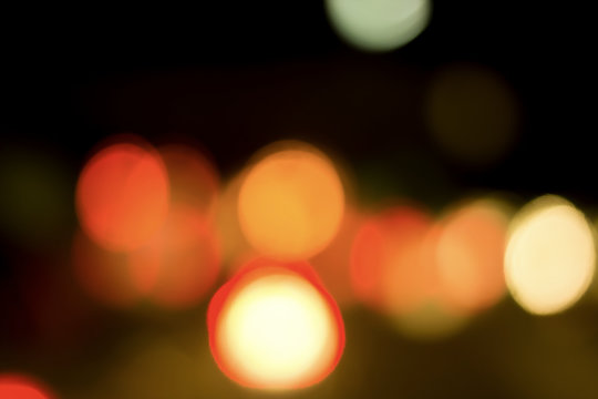 Bokeh with colorful spherical lights alternating with the background image.