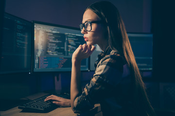 Side profile photo of intelligent thinking guessing woman working in late evening shift instead of her colleague system administrator