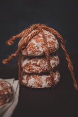 fresh gingerbread cookies tied with a rope on the table