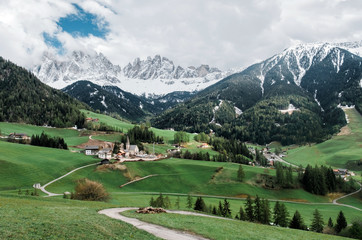 Fototapeta na wymiar Santa Maddalena village with Dolomites mountains in background.