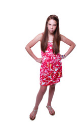 Angry teen girl with hands on hips.