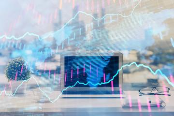 Forex Chart hologram on table with computer background. Double exposure. Concept of financial markets.