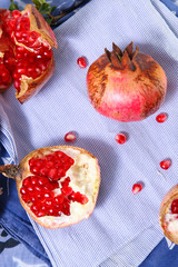 Obraz na płótnie Canvas ripe open pomegranate fruit in details. seasonal fruits